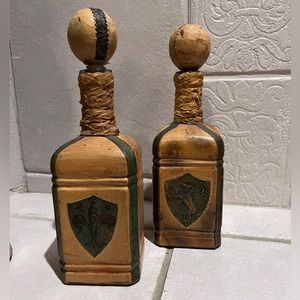 Antique Spanish wine bottles wrapped in leather.
